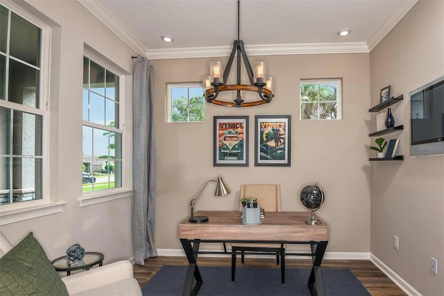 office space with crown molding, baseboards, dark wood-style flooring, and a wealth of natural light