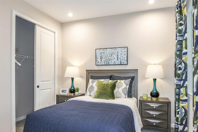 carpeted bedroom with recessed lighting, a closet, and baseboards