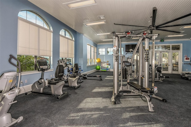 exercise room featuring visible vents and baseboards