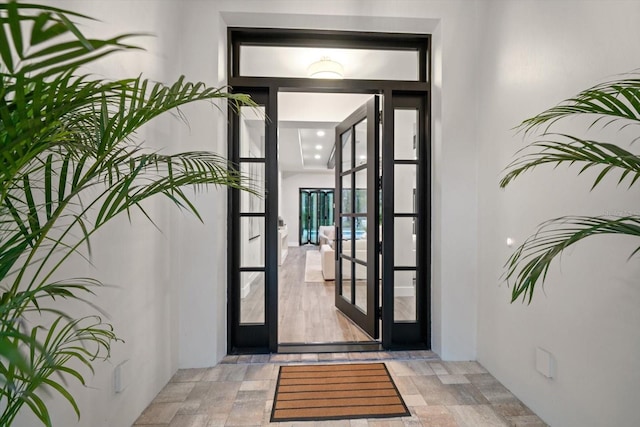 doorway to property with stucco siding