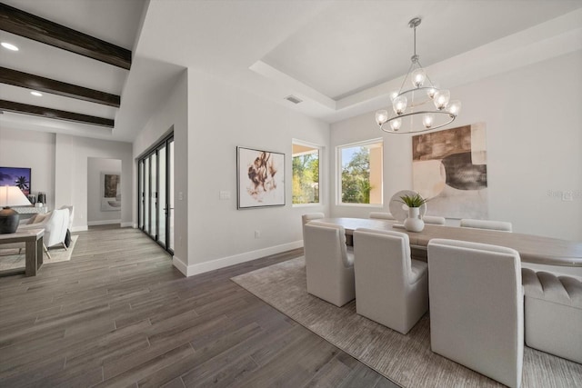 dining space with visible vents, baseboards, beam ceiling, an inviting chandelier, and dark wood-style floors