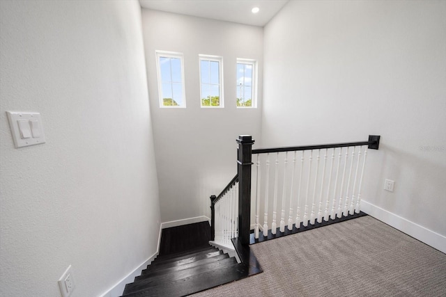 stairs featuring recessed lighting, carpet, and baseboards