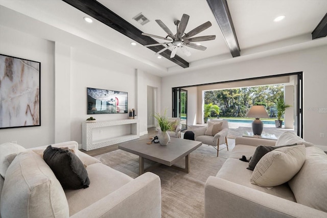 living room with recessed lighting, visible vents, beam ceiling, and a ceiling fan