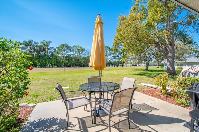 view of patio featuring outdoor dining space