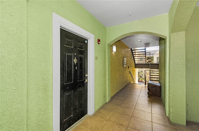 property entrance featuring a balcony