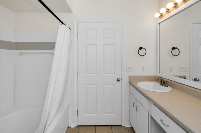 bathroom featuring tile patterned floors, vanity, and shower / bath combination with curtain