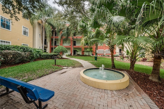 surrounding community with a lawn