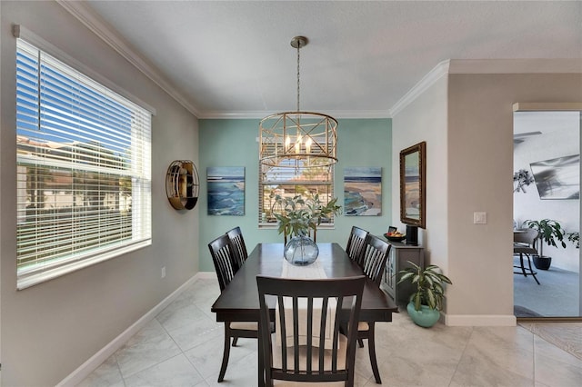 dining area with baseboards, a chandelier, and crown molding