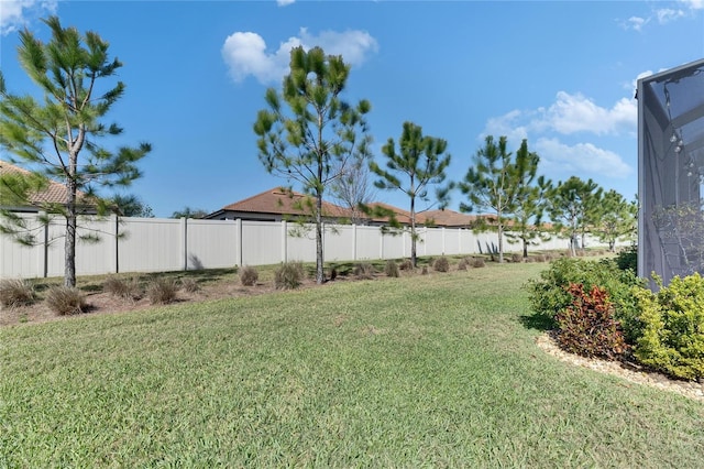 view of yard featuring fence