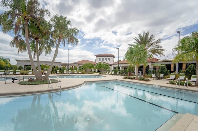 pool featuring a patio area