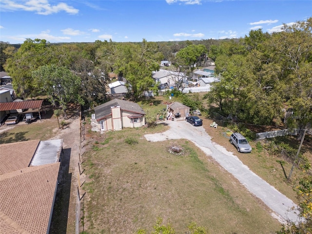 aerial view featuring a wooded view