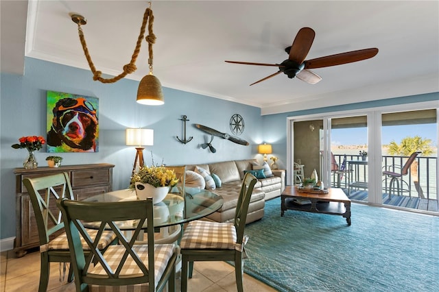 interior space featuring crown molding, tile patterned floors, and ceiling fan