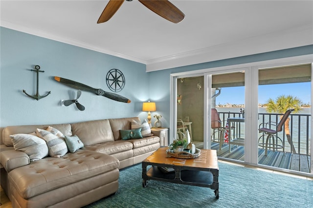 living area with plenty of natural light, crown molding, and a ceiling fan