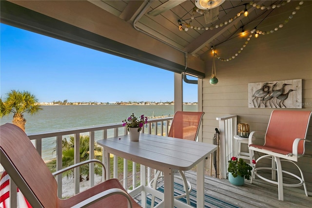 balcony featuring a water view