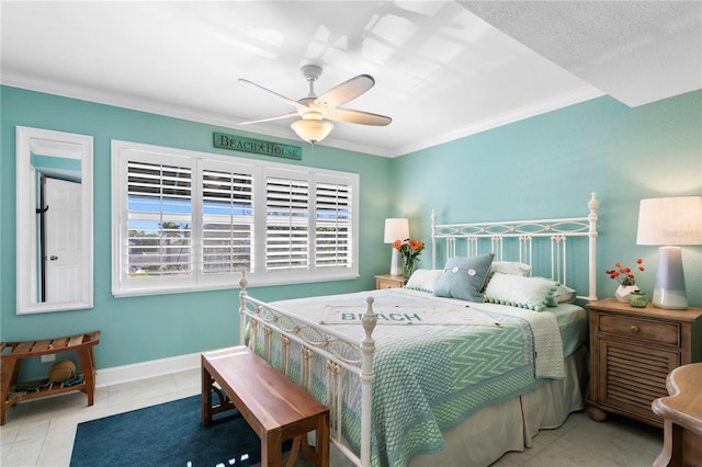 tiled bedroom featuring crown molding, a ceiling fan, and baseboards