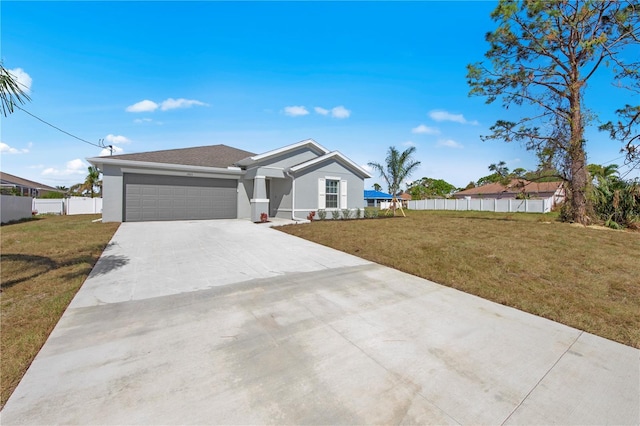 view of front of property featuring stucco siding, driveway, an attached garage, and fence