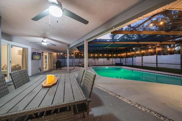 view of swimming pool featuring a lanai, a fenced backyard, and a fenced in pool