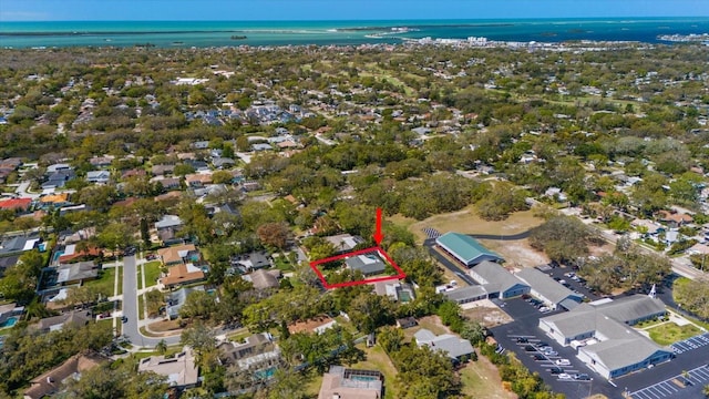 bird's eye view with a residential view and a water view