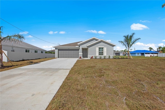 ranch-style house featuring stucco siding, a front lawn, concrete driveway, and an attached garage