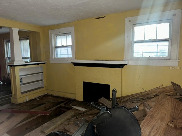 interior space featuring a textured ceiling