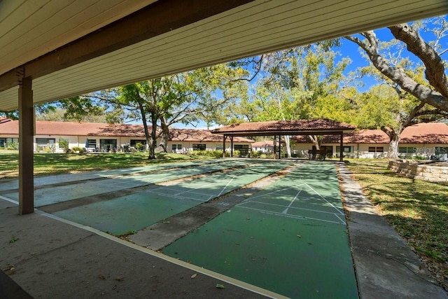 view of property's community with shuffleboard