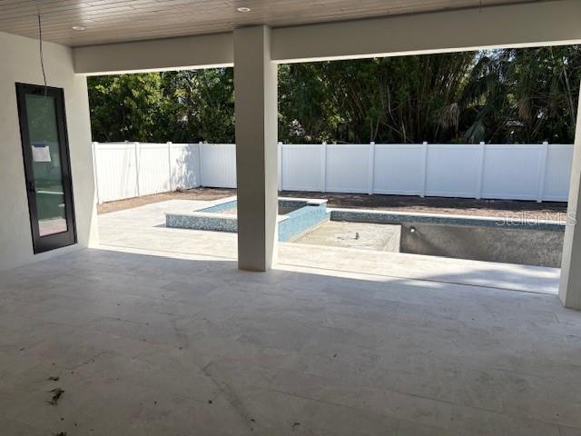 view of patio with a fenced backyard and a fenced in pool