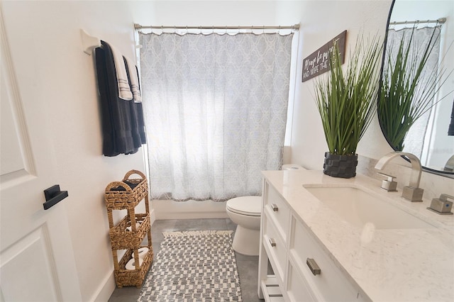 full bath with toilet, shower / bath combo, and vanity