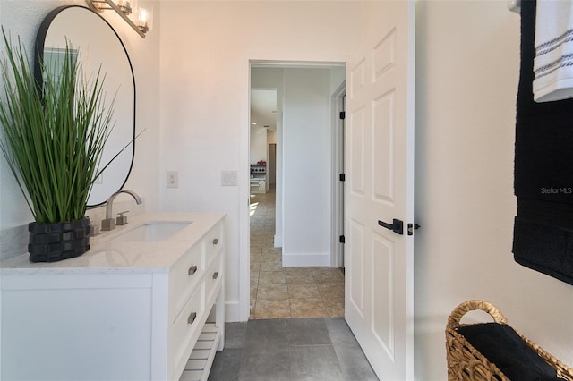 bathroom with vanity and tile patterned flooring