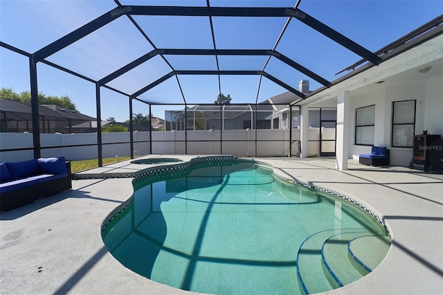 view of swimming pool featuring a fenced in pool, fence, an in ground hot tub, and a patio area