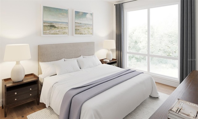 bedroom featuring wood finished floors