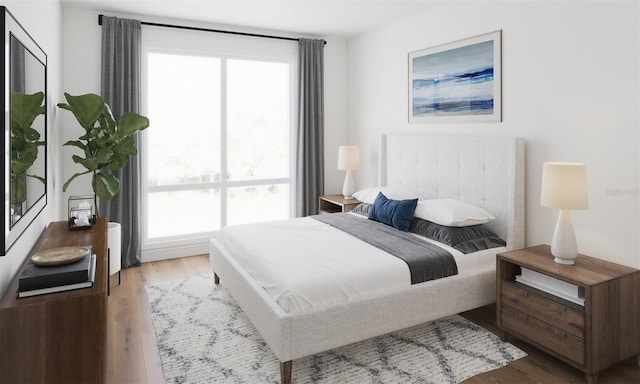 bedroom with wood finished floors