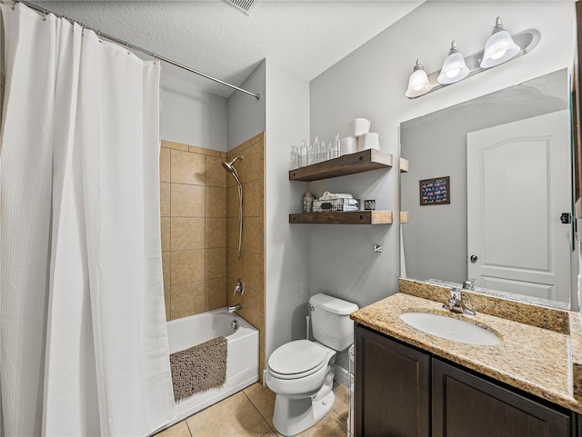 full bath with shower / bath combo with shower curtain, toilet, vanity, tile patterned floors, and a textured ceiling