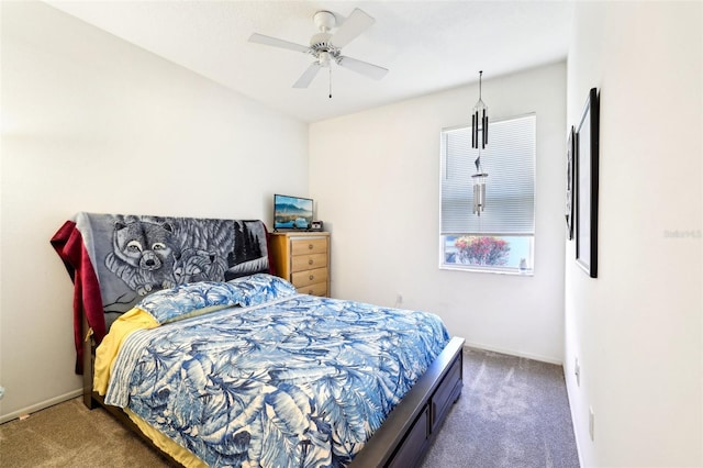 bedroom with baseboards, carpet, and ceiling fan