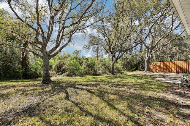 view of yard featuring fence