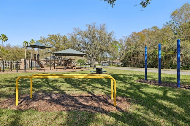 surrounding community featuring playground community and a yard