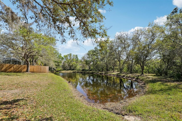 water view featuring fence