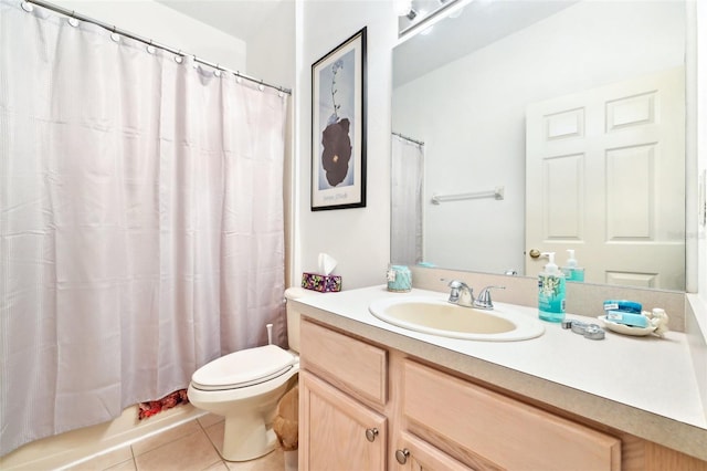 full bathroom with tile patterned floors, toilet, and vanity