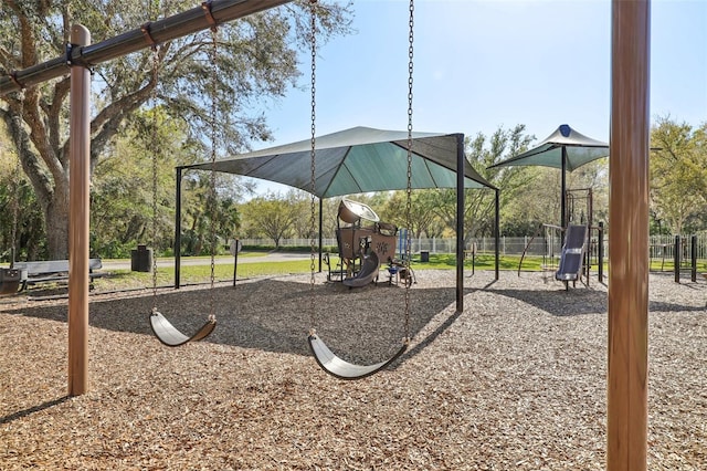 community playground featuring fence