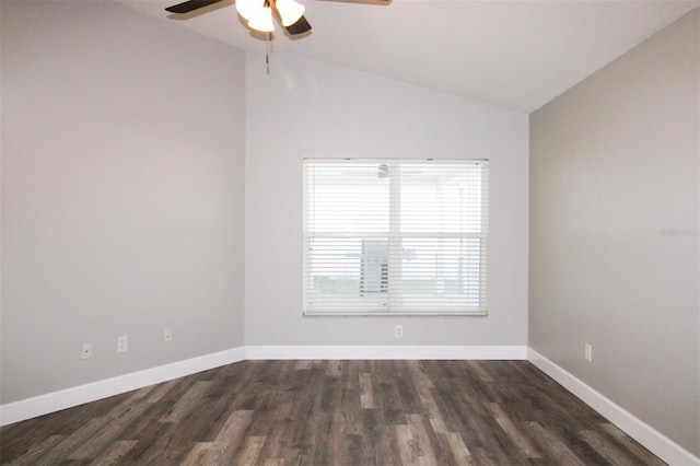 unfurnished room featuring baseboards, wood finished floors, a ceiling fan, and vaulted ceiling