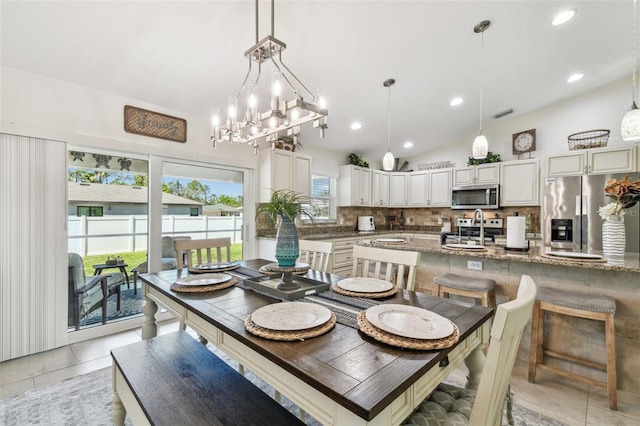 dining room featuring visible vents, recessed lighting, light tile patterned floors, a chandelier, and vaulted ceiling