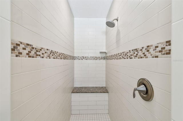 details featuring a tile shower