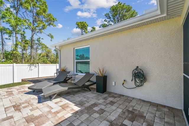 view of patio / terrace with fence