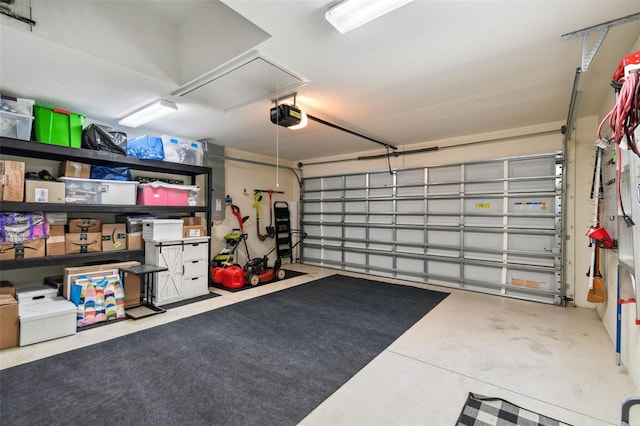 garage featuring a garage door opener