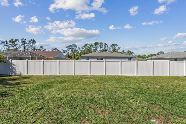 view of yard featuring fence