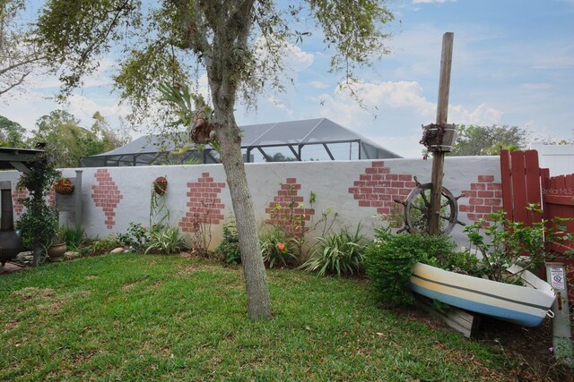 view of yard with fence