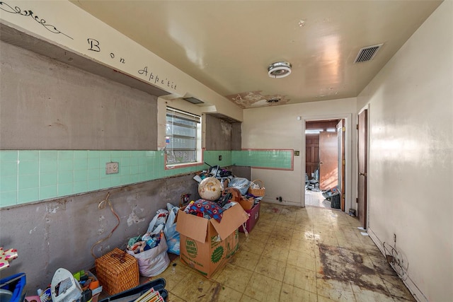 kitchen with tile patterned floors and visible vents