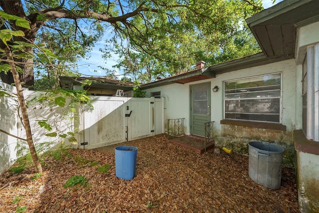 exterior space with a gate and fence