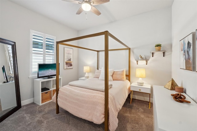 carpeted bedroom featuring baseboards and ceiling fan