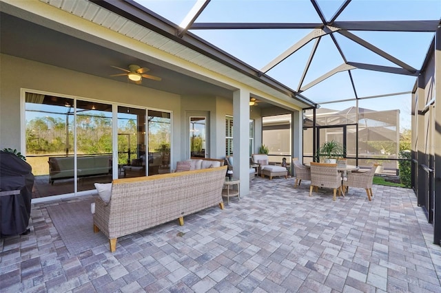 exterior space featuring a ceiling fan