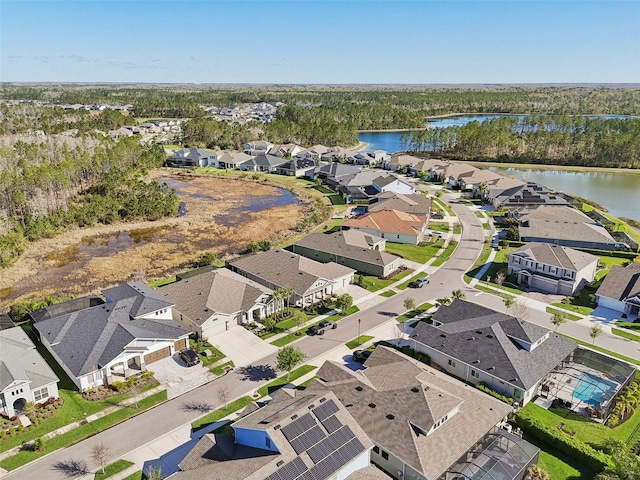 aerial view with a water view and a residential view